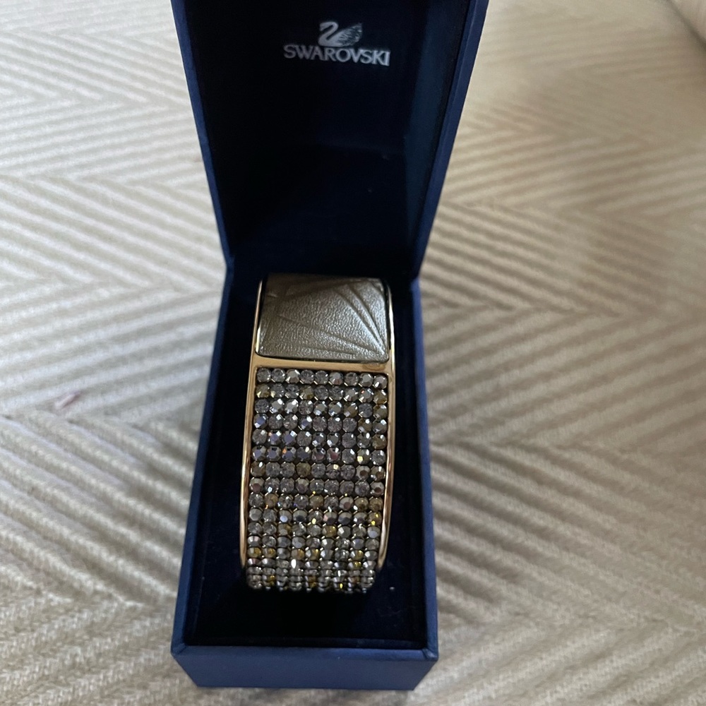 Swarovski crystal bracelet detailed with leather and crystals.
